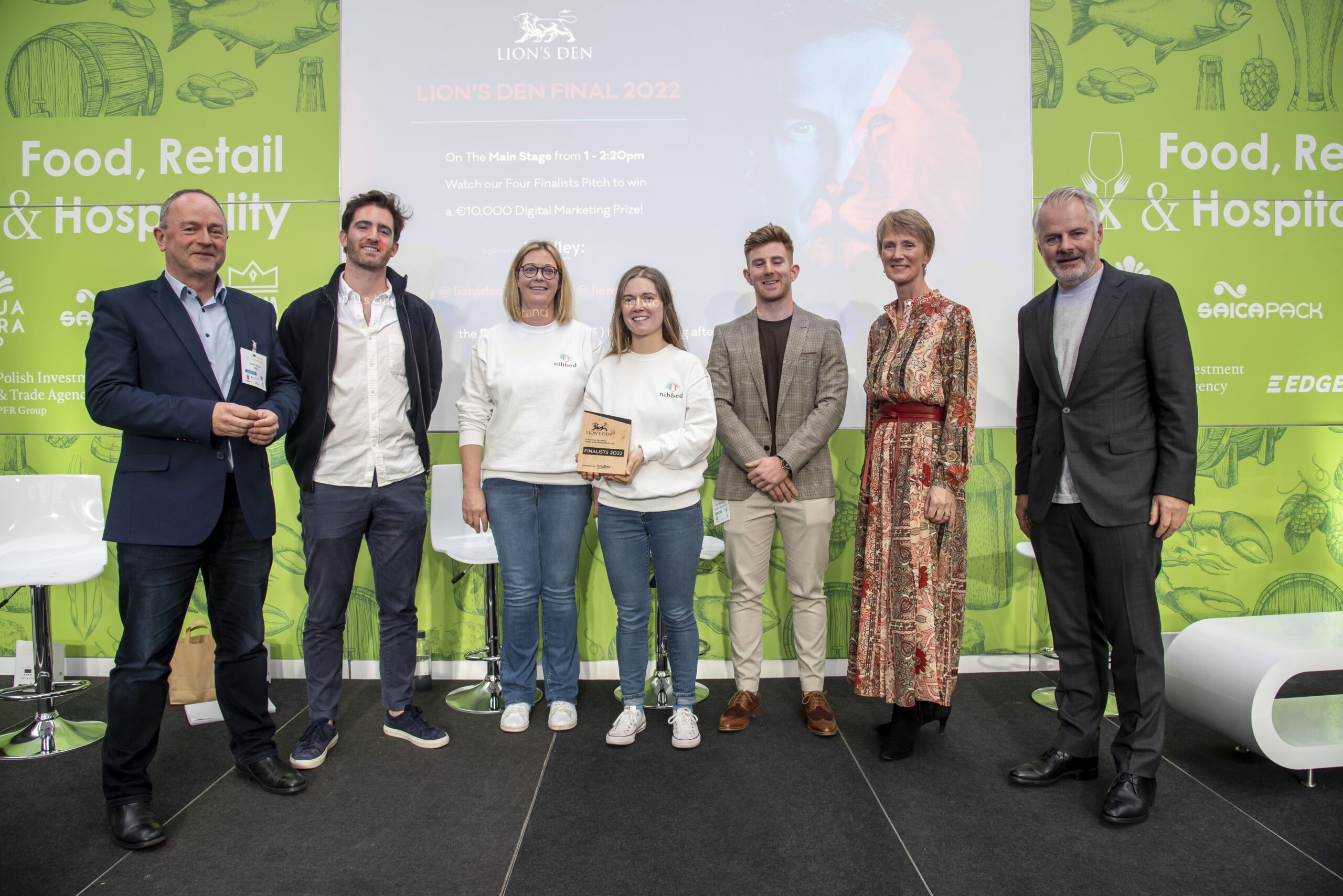 Nibbed Cacao Finalists on stage with judges of Lion's Den 2022