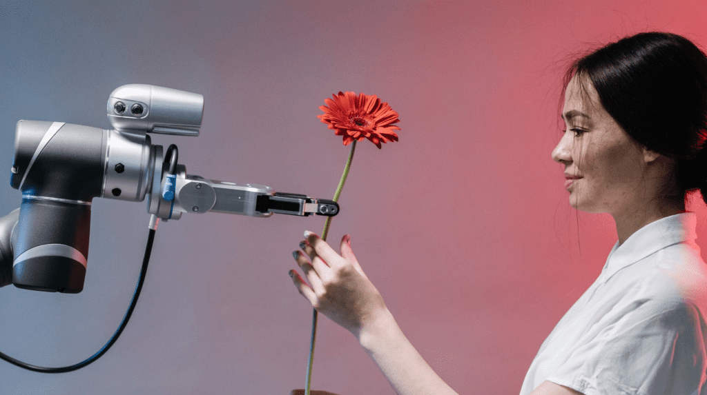 Robot handing woman flower - beyond automation and AI